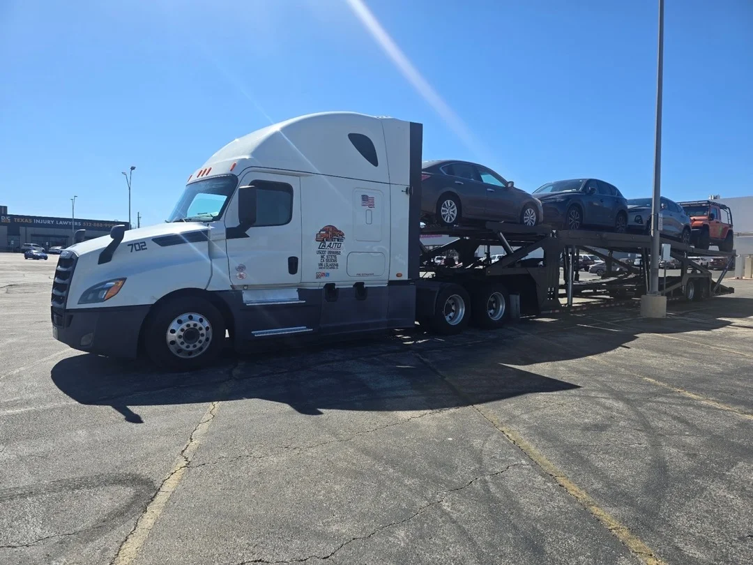 CA Auto Express open carrier truck loaded with vehicles